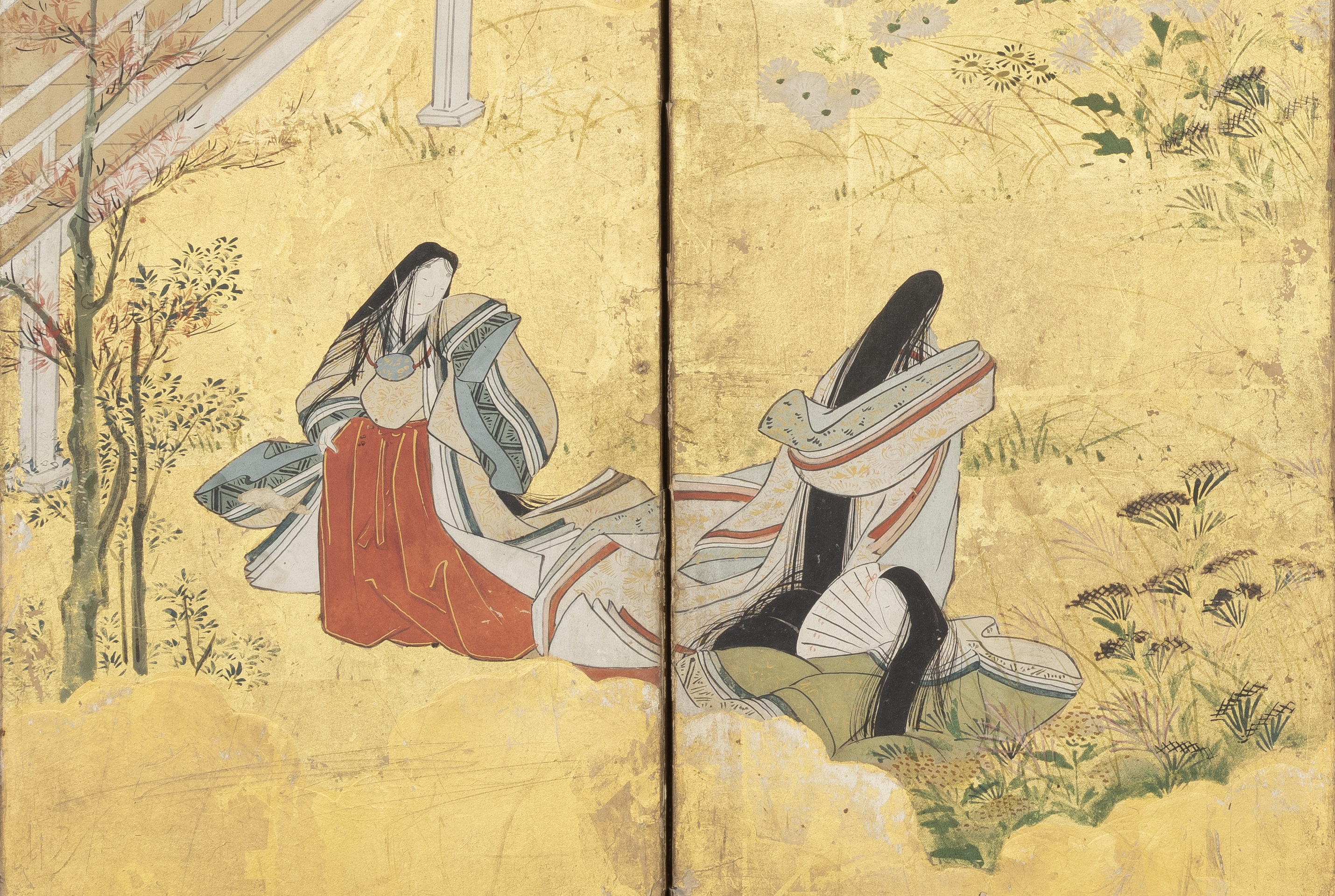 Dibujo japonés de dos mujeres sobre pan de oro.